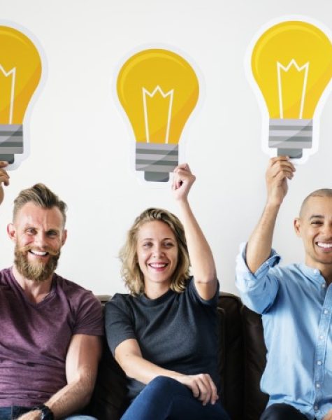 People carrying light bulb icons