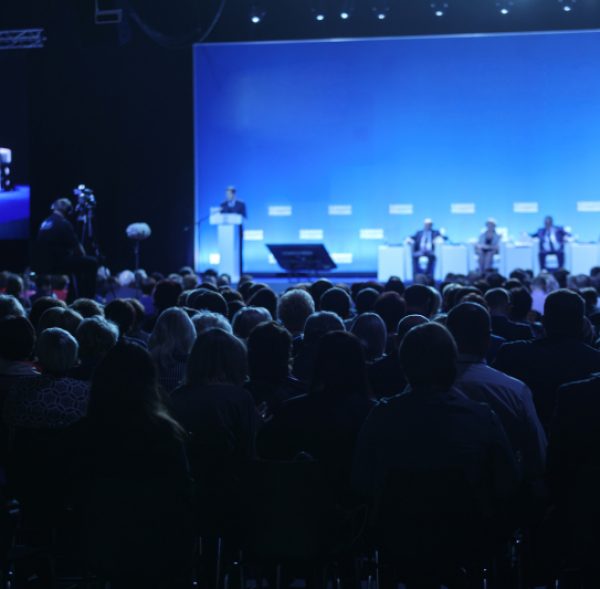 Audience at the conference hall. Business Conference and Presentation