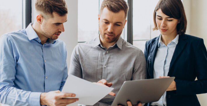 Group of business people working in office